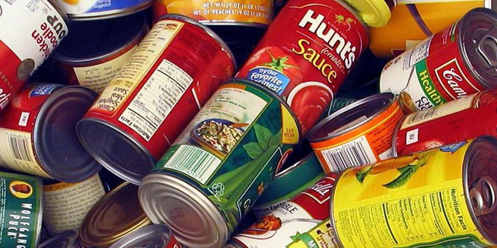 box of canned food items
